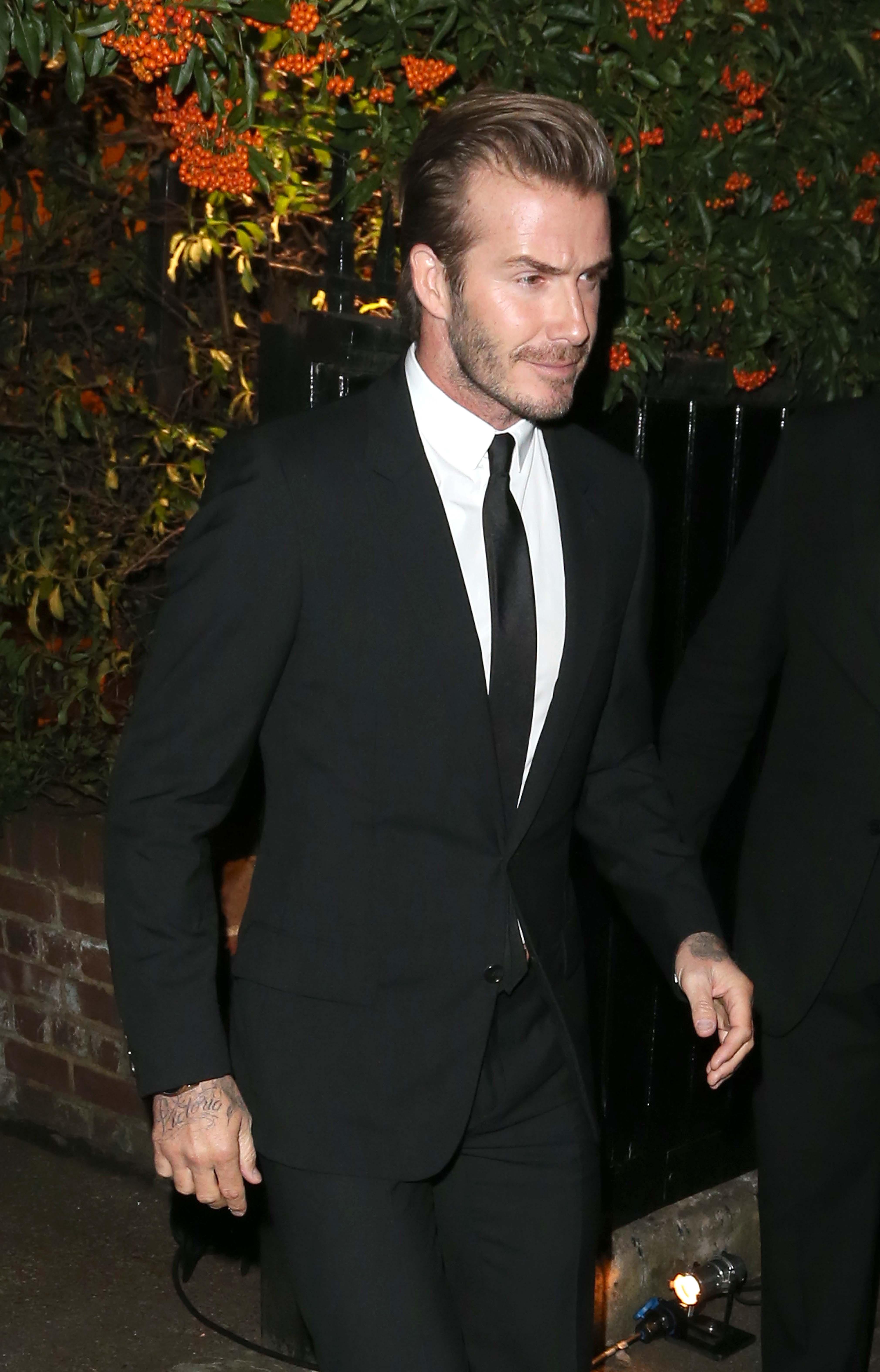 David and Victoria Beckham leaving the Global Fund and British Council Party for LFW