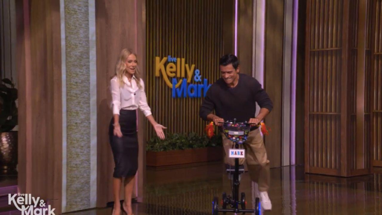 Image of Mark Consuelos returned to 'Live' after foot surgery.