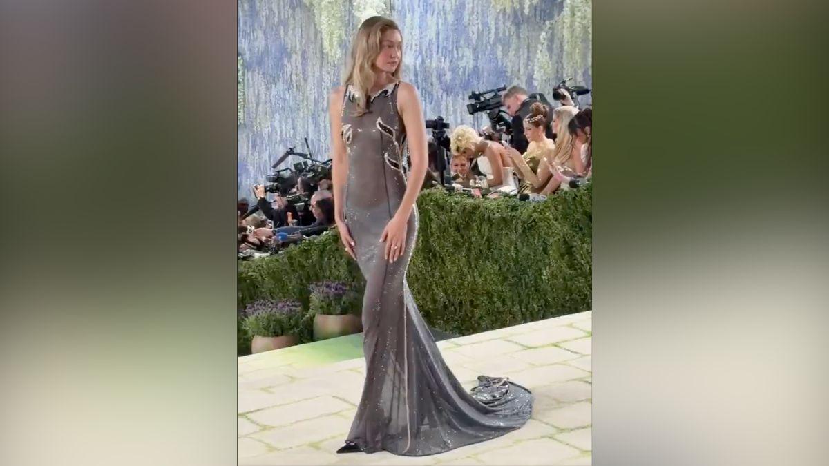 gigi hadid stuns see through gown rare flirty mention bradley cooper