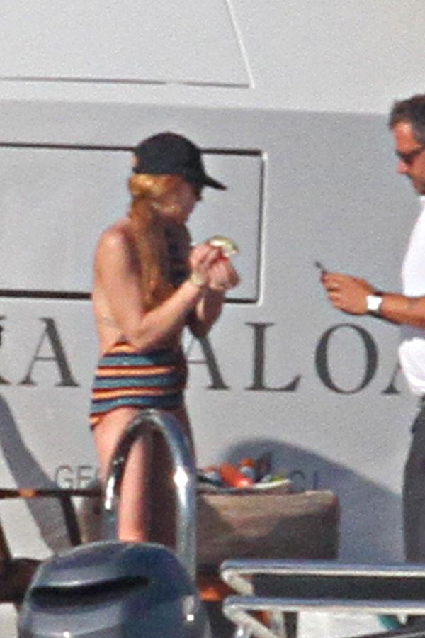 lindsay lohan pregnant baby bump one piece bathing suit