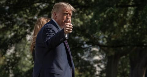 donald trump waving invisible crowd