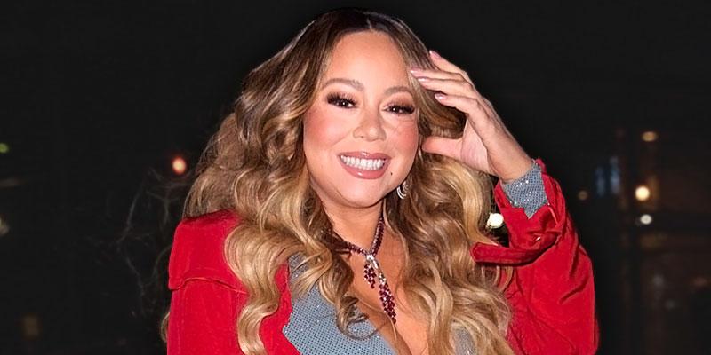 Smiling Mariah Carey Wearing Red Coat