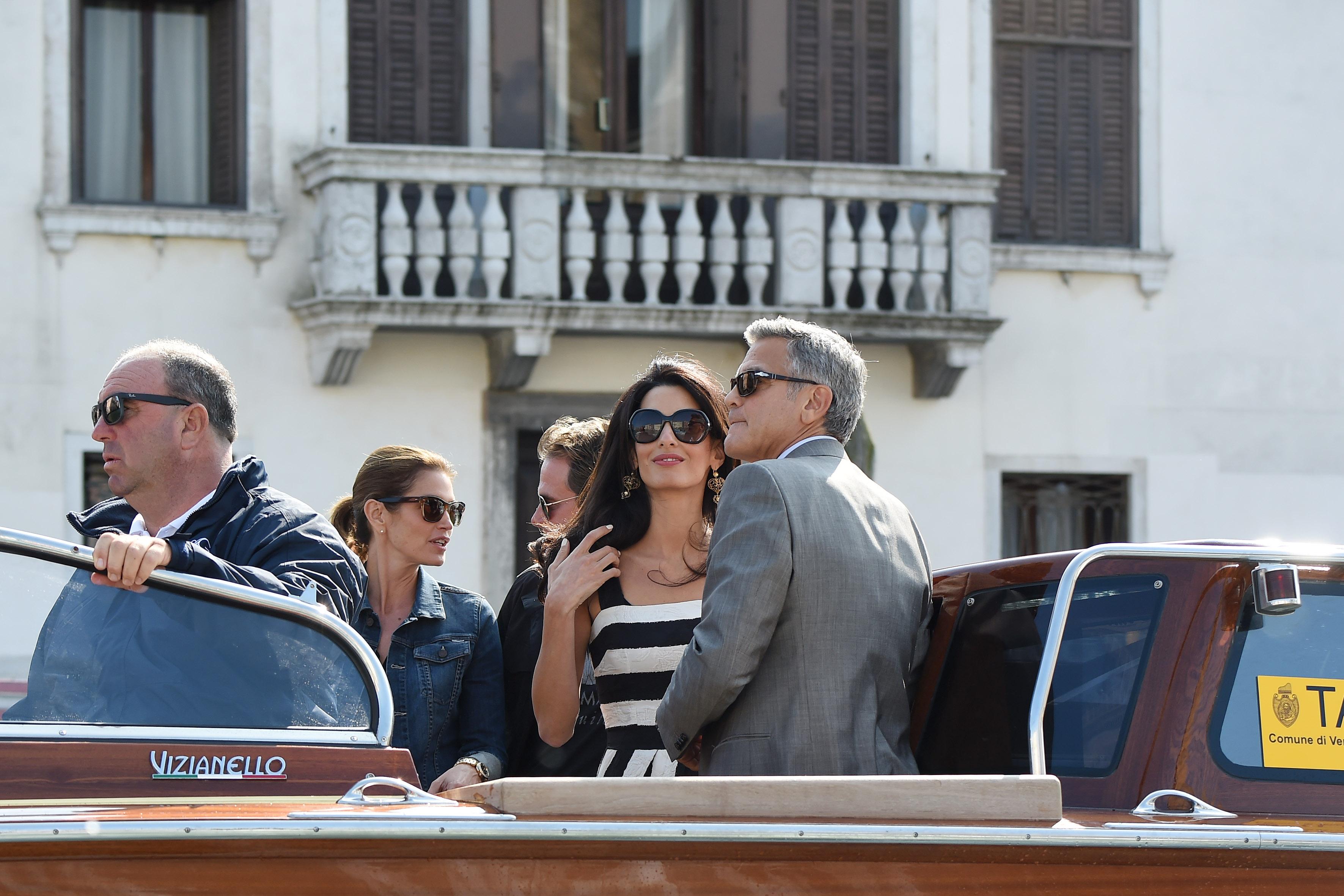 George Clooney and Amal Alamuddin arrive in Venice for their wedding