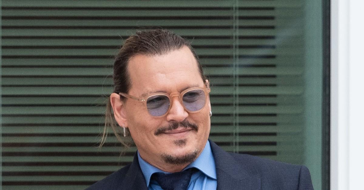 Johnny Depp Smiling As He Steps Out With Mystery Red Head