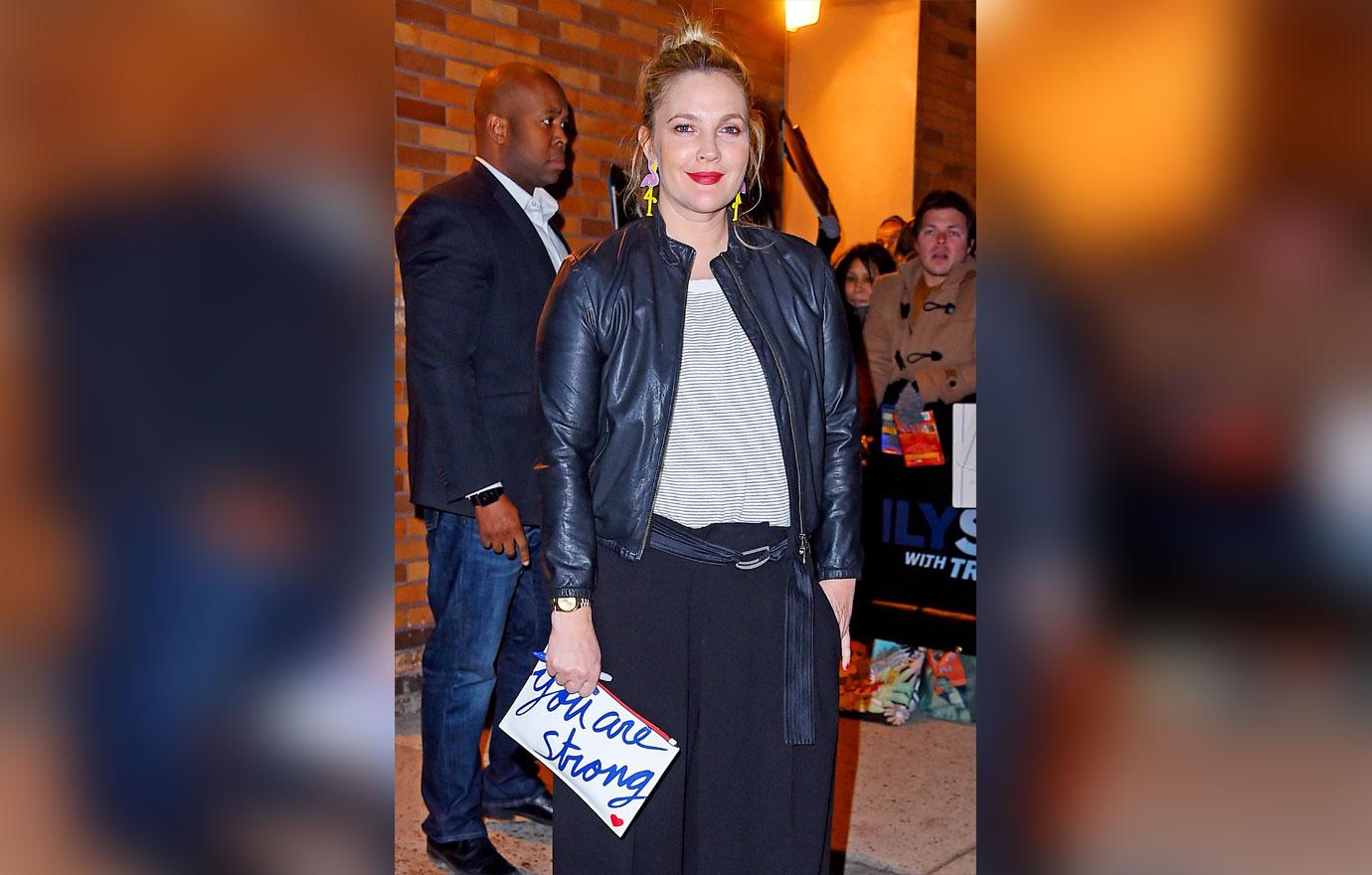 Drew Barrymore poses for pictures at &#8216;The Daily Show with Trevor Noah&#8217;