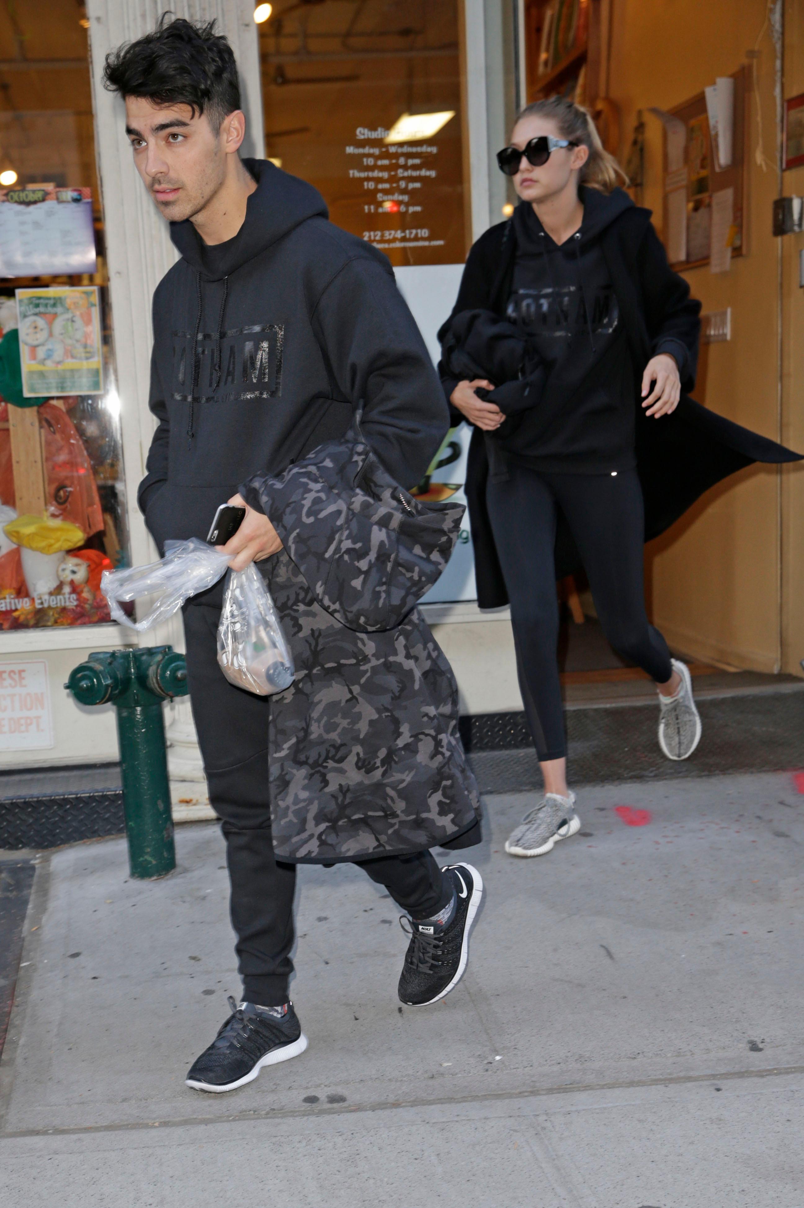 Gigi Hadid and Joe Jonas seen at Color Me Mine Paint and Ceramics studio in Tribeca, New York City