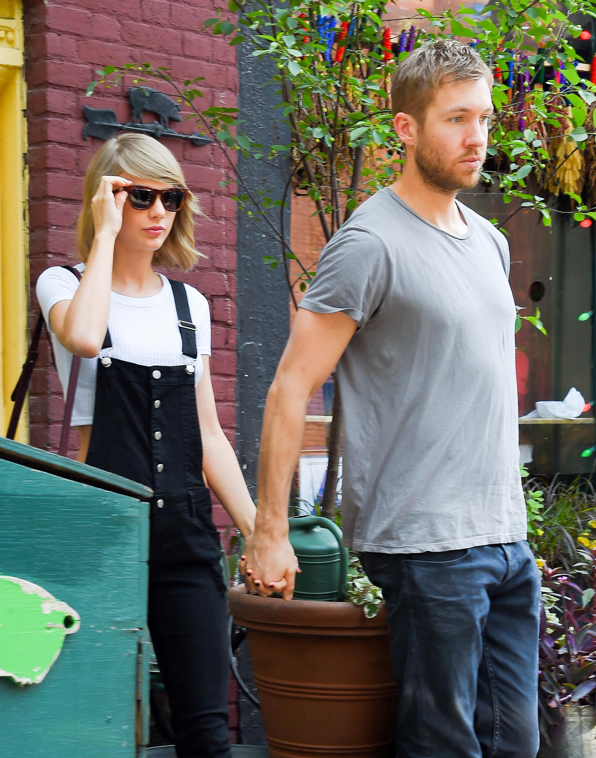 Taylor Swift and Calvin Harris spotted holding hands while leaving The Spotted Pig in the West Village in New York City