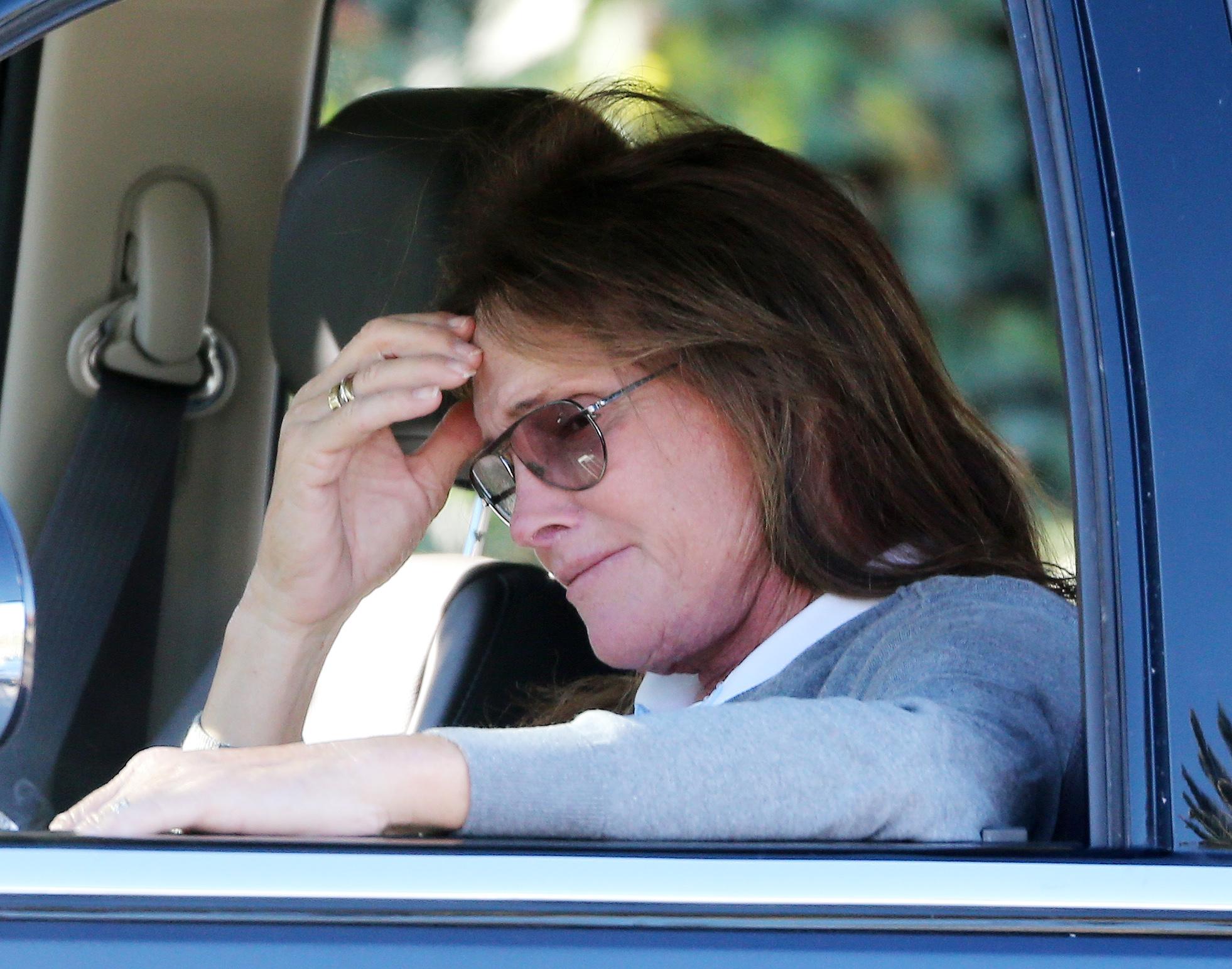 EXCLUSIVE: **PREMIUM RATES APPLY** Bruce Jenner looks very sad as he smokes a cigarette in his car the day InTouch magazine publish a story about his alleged transition to a woman on the cover.