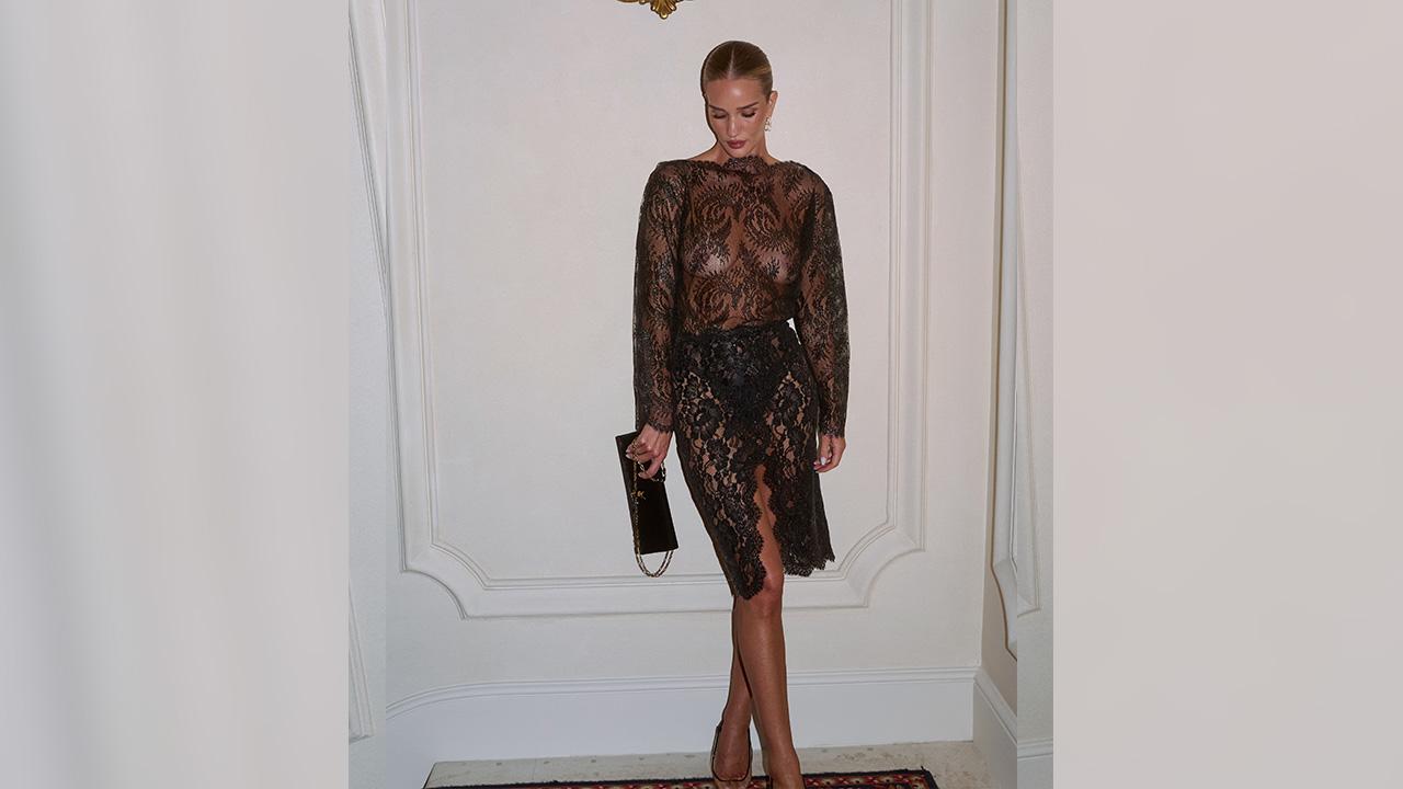 Image of One social media user told Rosie Huntington-Whiteley said she looked 'stunning,' while another called her dress 'tacky.'
