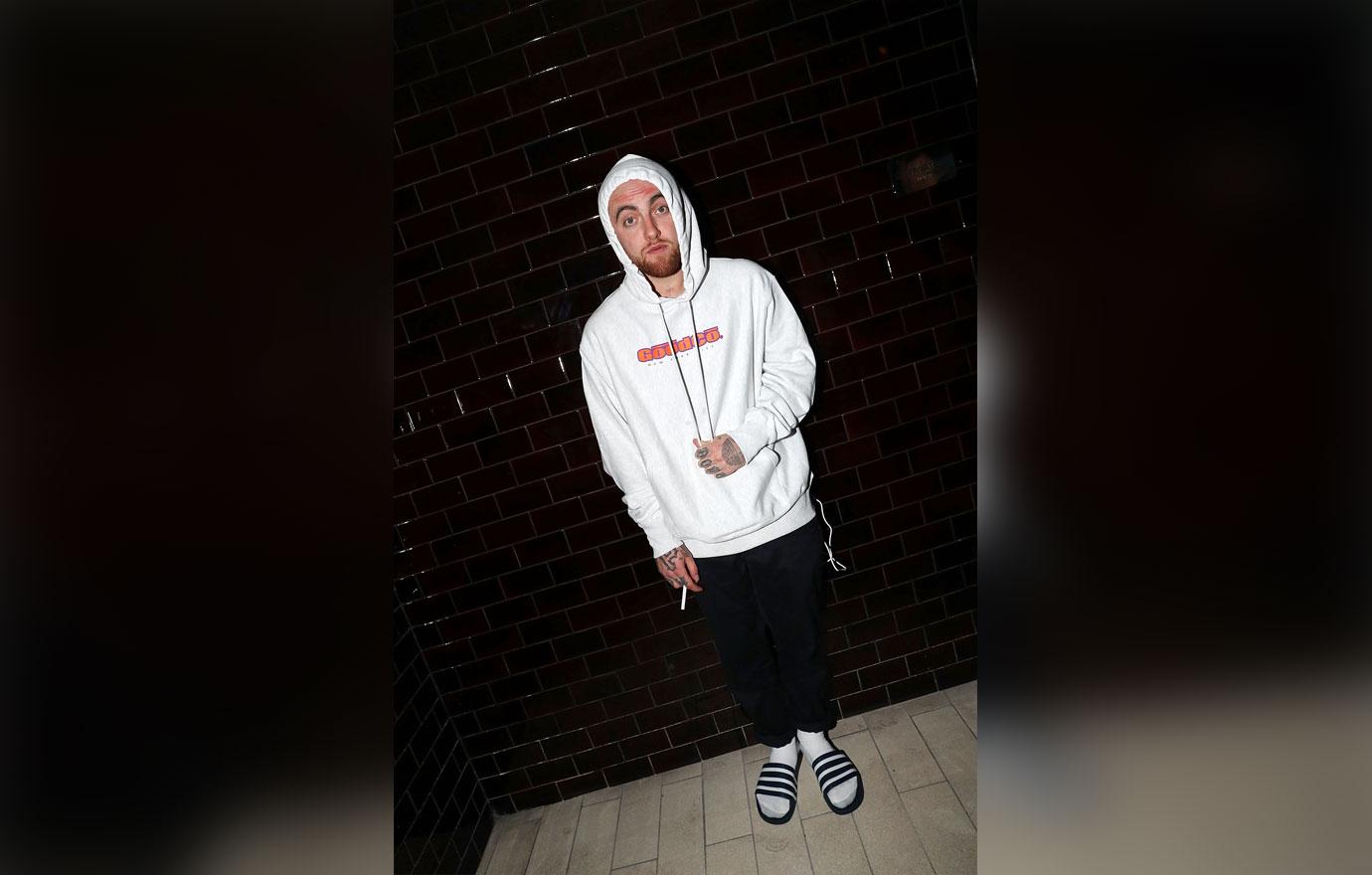 Mac in white hoodie