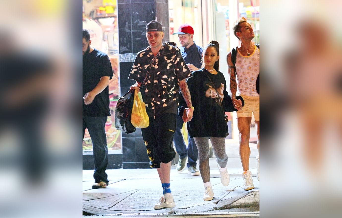 EXCLUSIVE: Ariana Grande and Pete Davidson are all smiles as they step out hand in hand in NYC