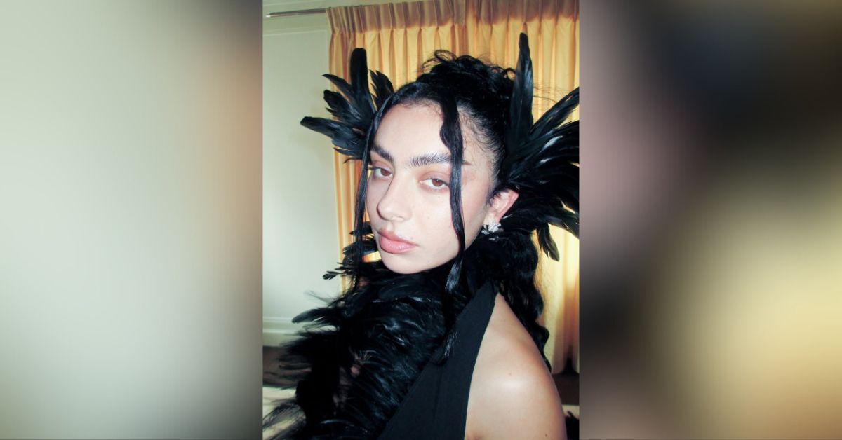 charli xcx feathers black met gala look