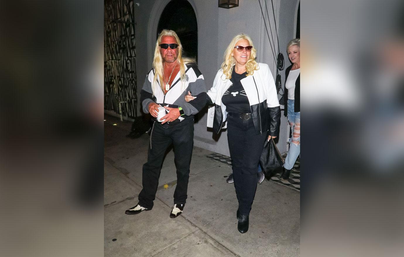 Dog And Beth Chapman Outside A Restaurant