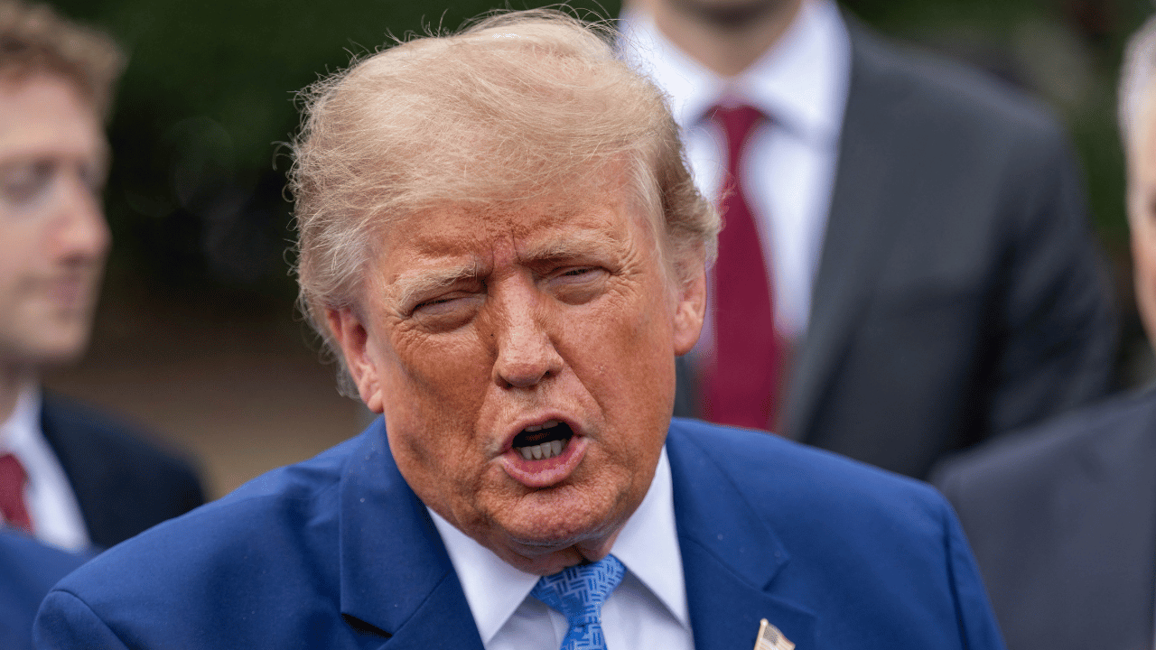 photo of Donald Trump dissed Kaitlan Collins, claiming she's 'unhappy' and 'never smiles.'