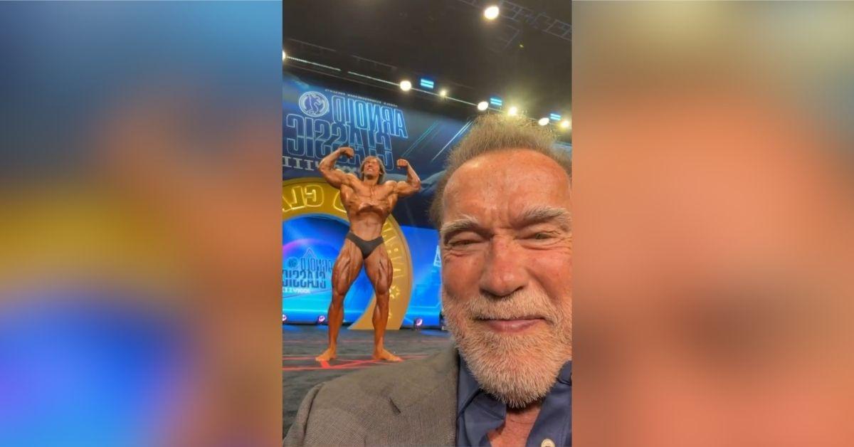 image of Arnold Schwarzenegger proudly supported his son Joseph Baena during his bodybuilding competition. 