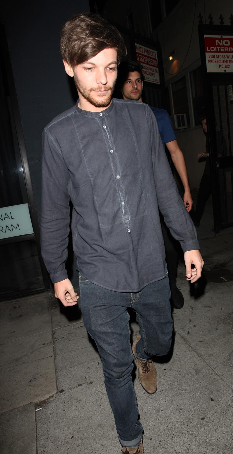 Louis Tomlinson leaves Warwick nightclub