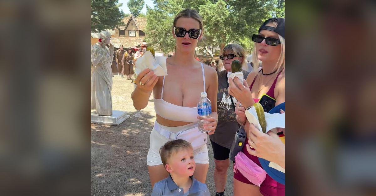 Cynthia Jade shares pickles at the Renaissance Faire with friends.