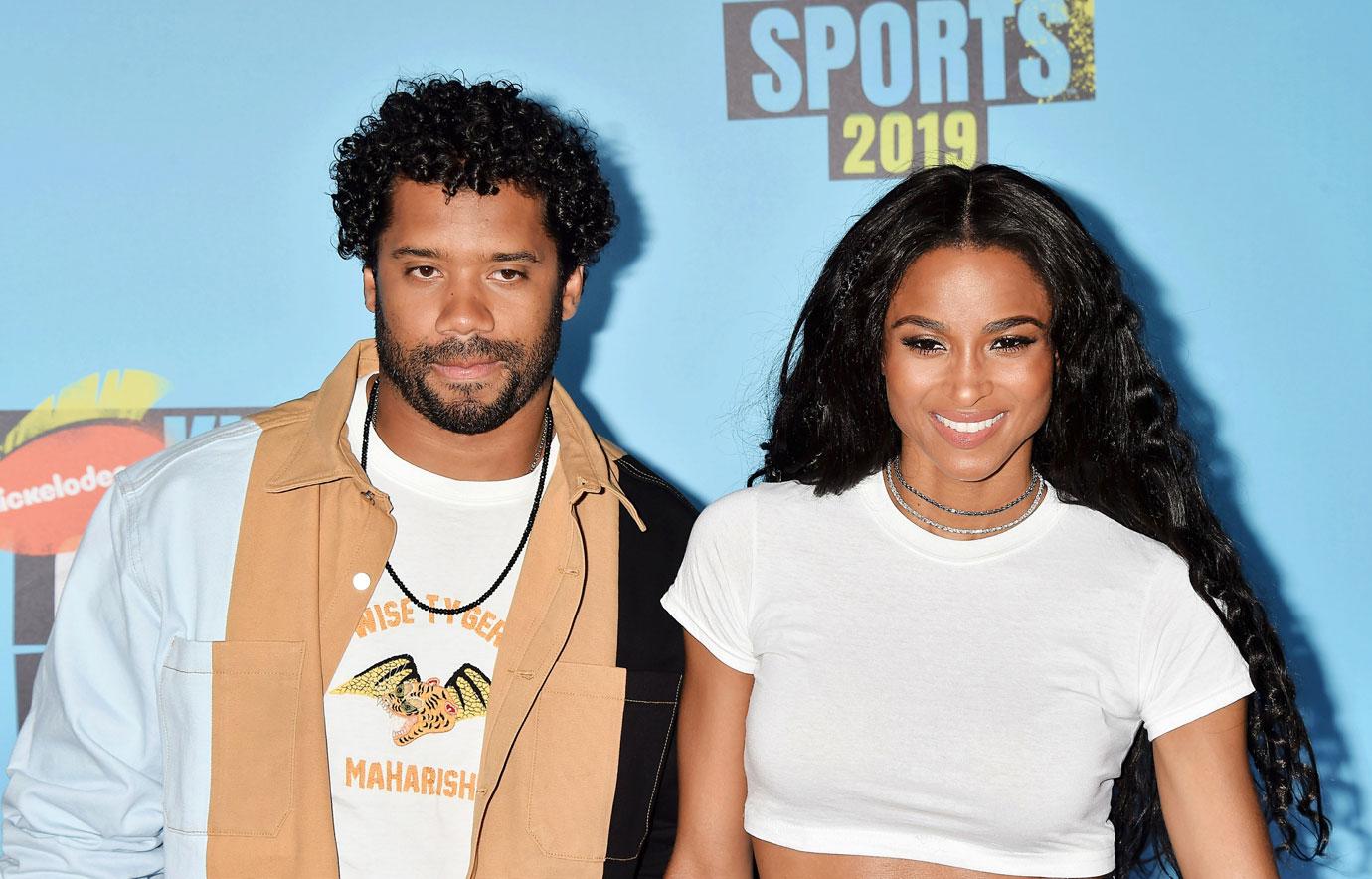 Russell Wilson and Ciara cheering on their Yankees family