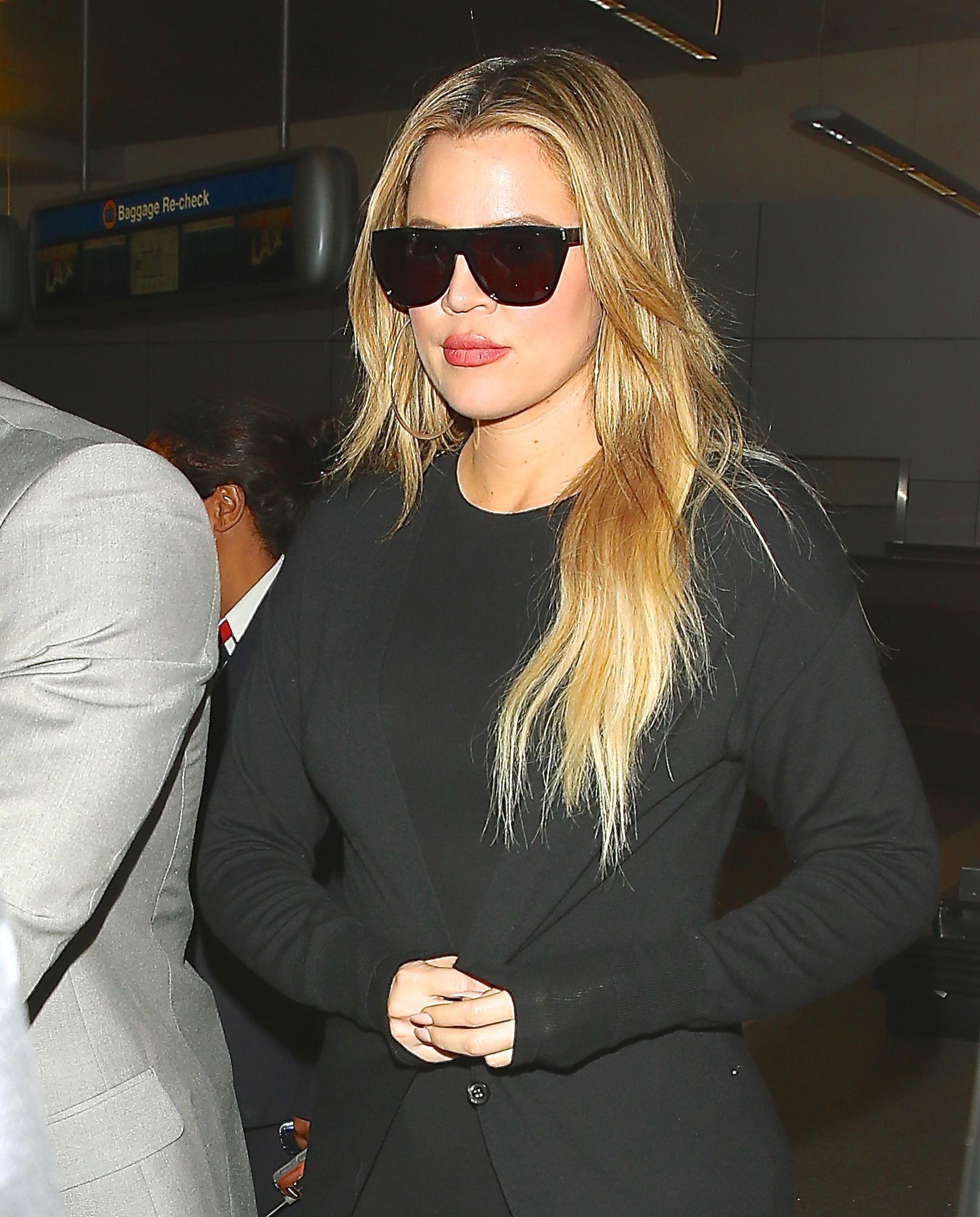 Khloe Kardashian arriving back at LAX Airport from Armenia