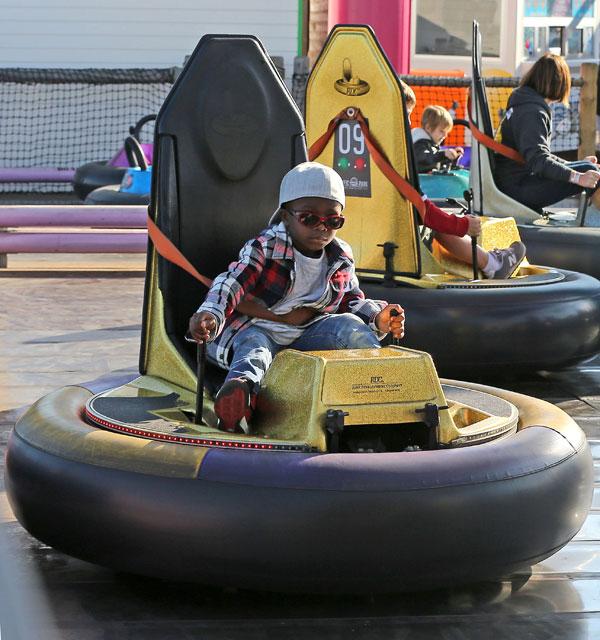 sandra bullock son louis bumper car fun