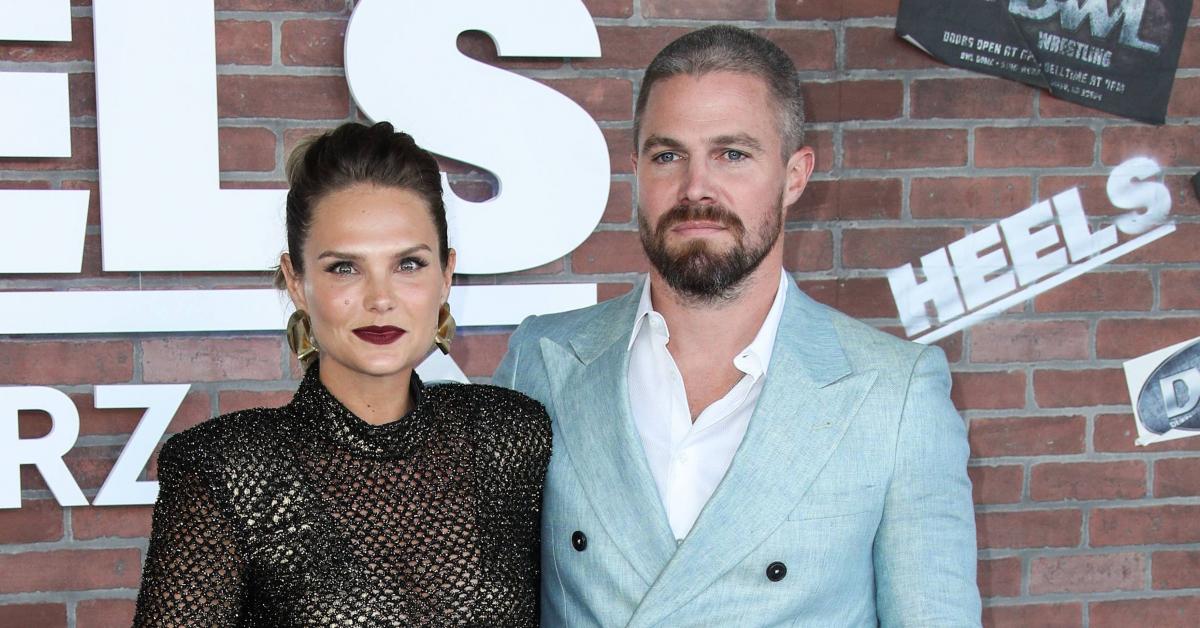 stephen amell packs on pda with wife months after blowout