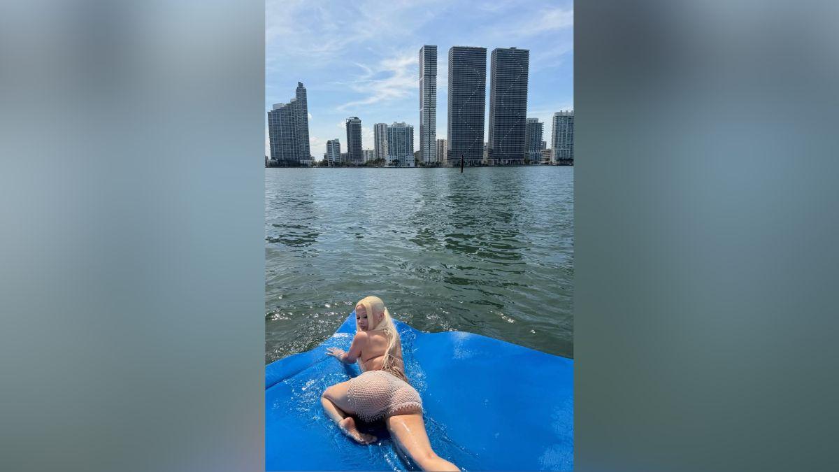 Image of Alabama Barker soaked in the sun in Miami, Fla.