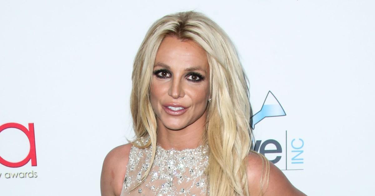 Britney Spears shares new close-up photo of her boobs spilling out of bra  and threatens to 'pop' them 'like a balloon