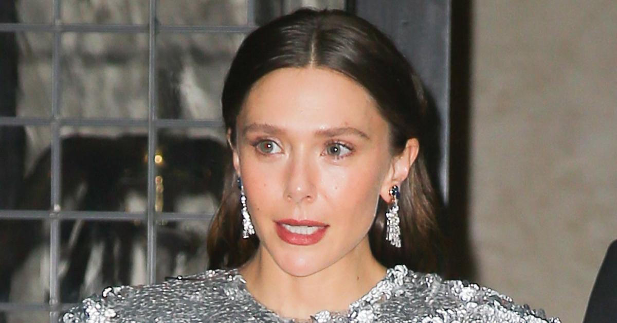 image of Elizabeth Olsen, 36, is the younger sister of Mary Kate and Ashley, 39.