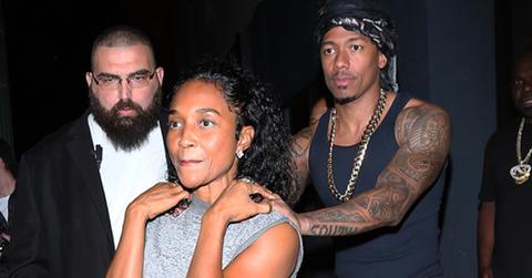 Nick Cannon puts his hands on TLC singer Rozonda Thomas’ shoulders as they leave Warwick nightclub together in Hollywood