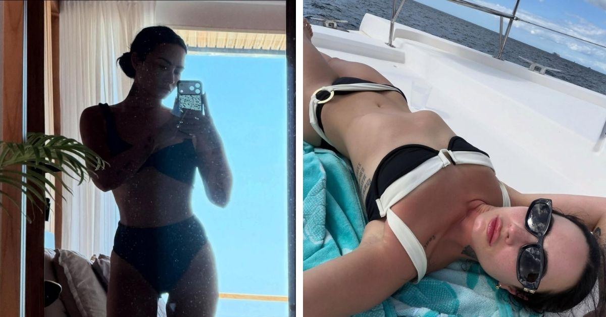 image of The singer posed on a boat in her retro black-and-white swimsuit.