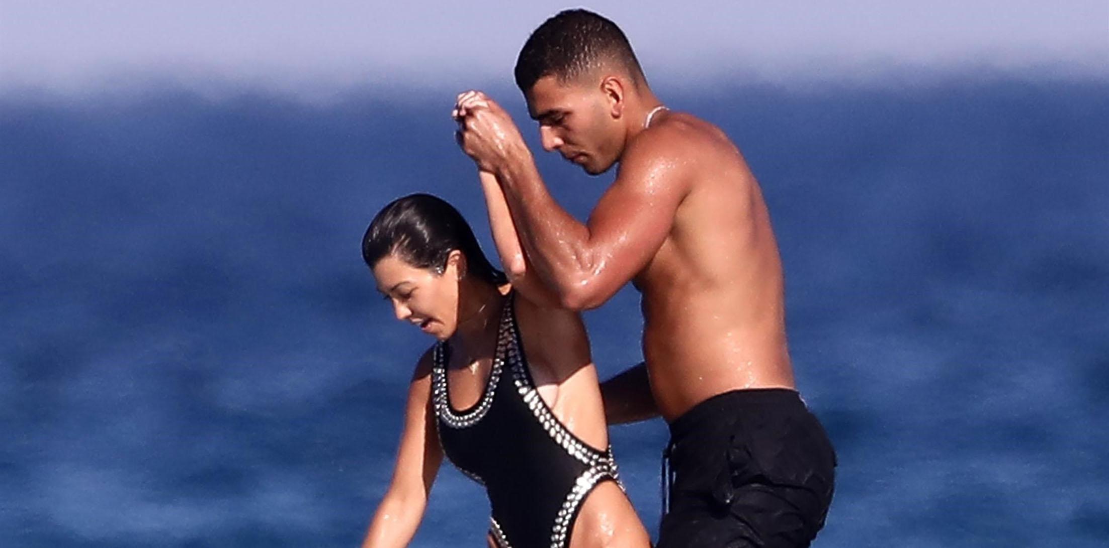 Kourtney Kardashian shows off her body in tight swimsuit during