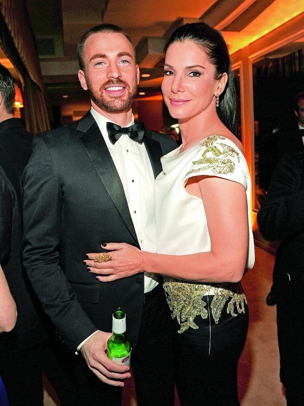 Sandra Bullock and Chris Evans