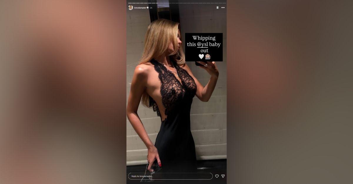 image of Brooks Nader wore a daring black lace dress.