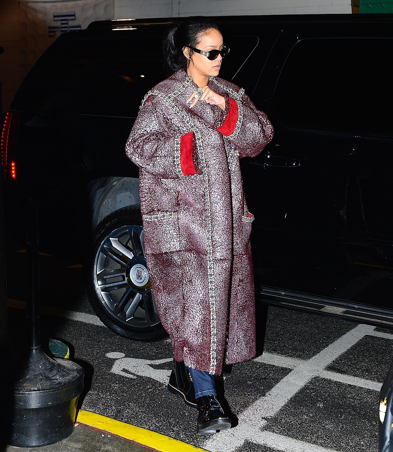 Rihanna wears a crazy coat as she heads to a photoshoot for her album cover