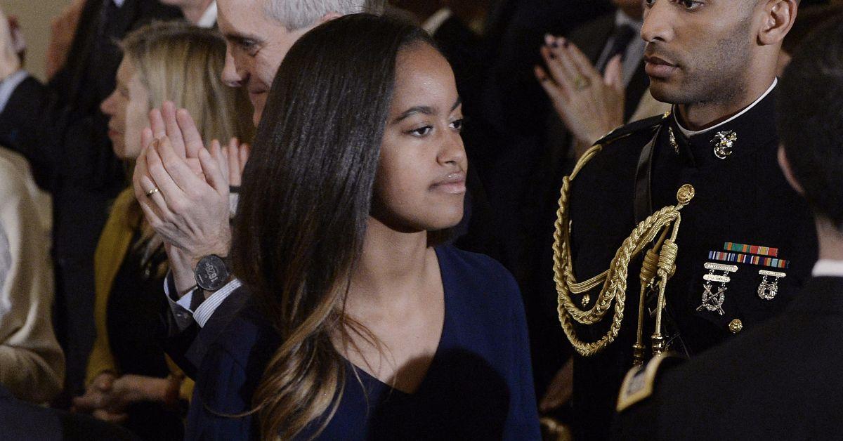 Photo of Michelle Obama compared Sasha to a cat.