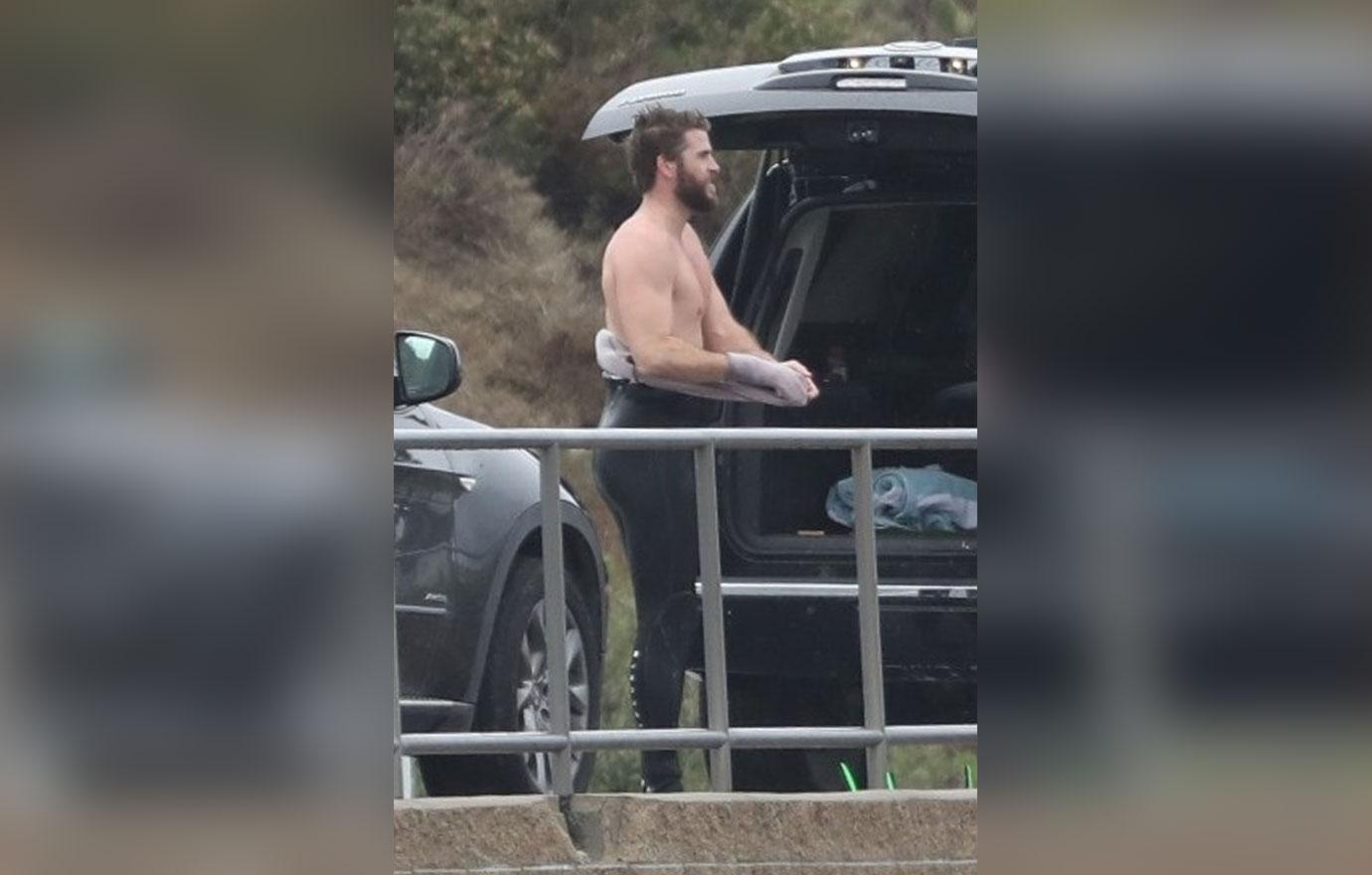 *EXCLUSIVE* Liam Hemsworth strips off after surfing in Malibu