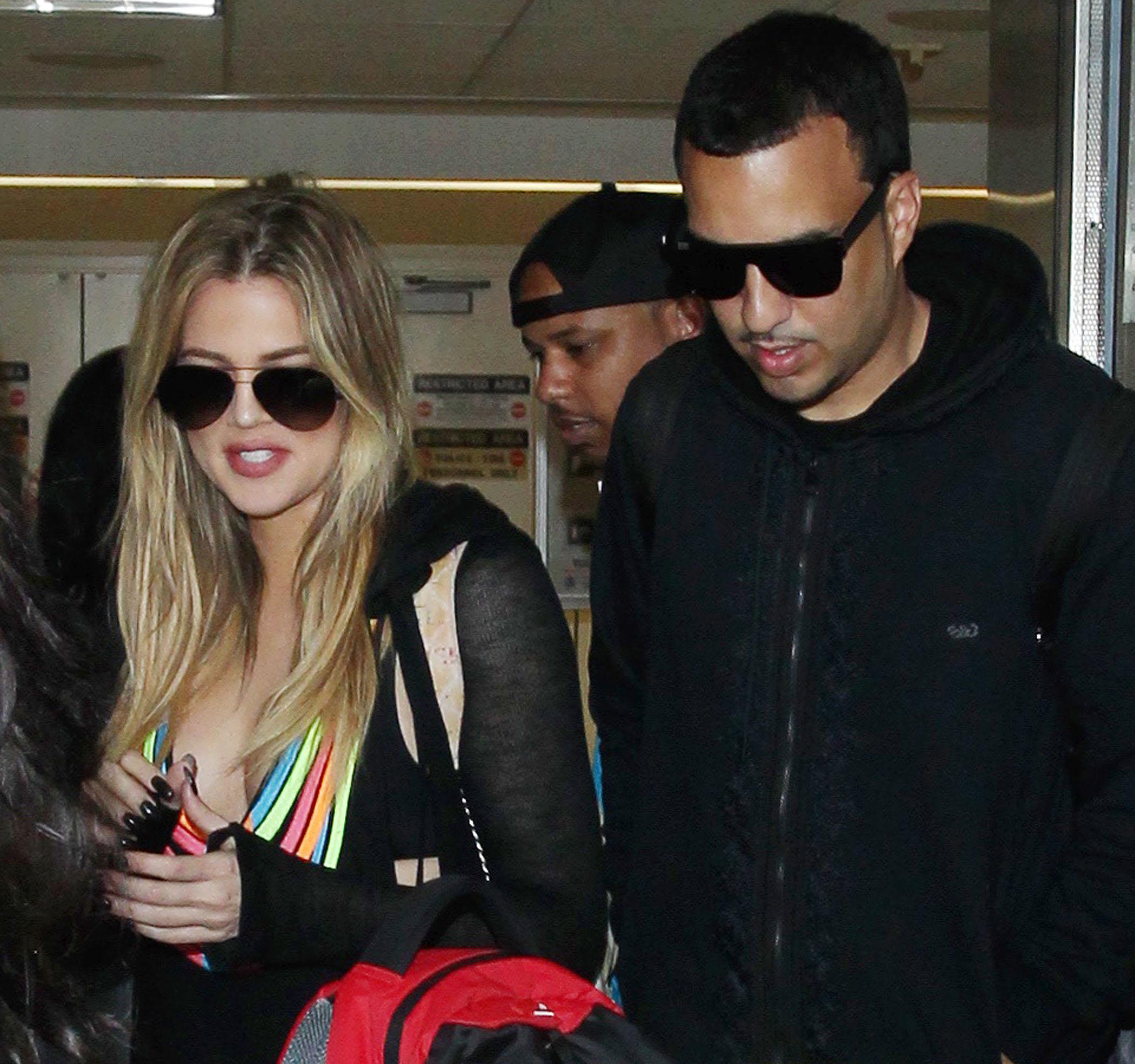 ***NO DAILY MAIL SALES*** Khloe Kardashian and French Montana return to LA from romantic beach holiday together in Miami