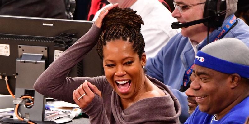 Regina King laughs at Knicks game