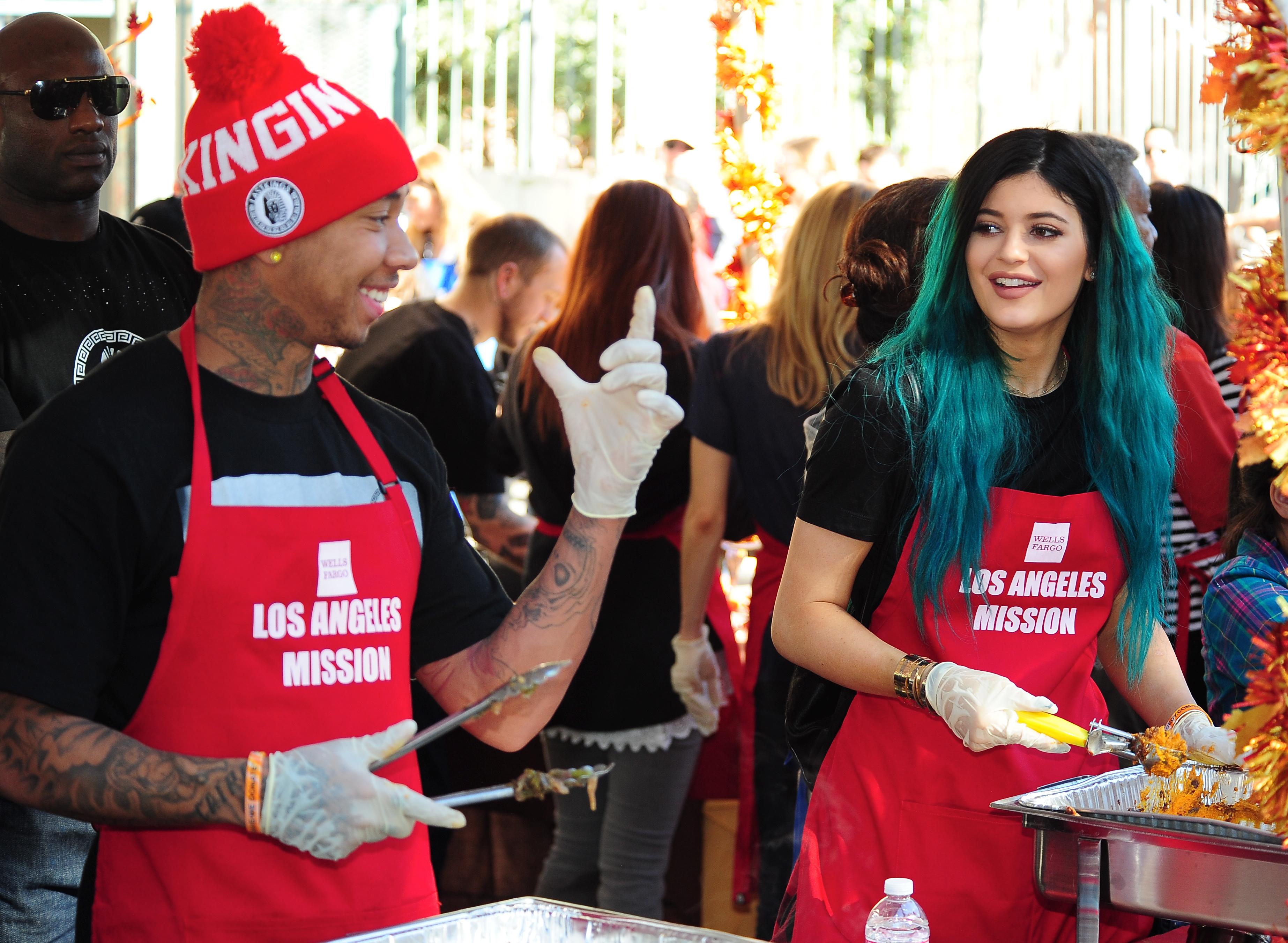 Kylie Jenner joins reported boyfriend, rapper Tyga, as they serve up Thanksgiving dinner to the homeless at the Los Angeles Mission in downtown Los Angeles, CA