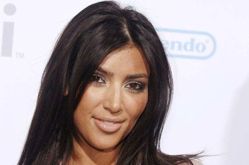 Kim Kardashian wears a messy hairstyle and nude lips in this photo taken at the 2006 launch party for Nintendo Wii game console.