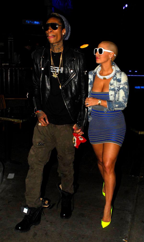 Amber Rose and Wiz Khalifa leave the Guns and Roses show at the House of Blues