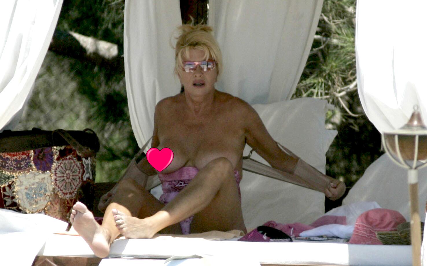 Ivana Trump flashes on the beach, St Tropez, France