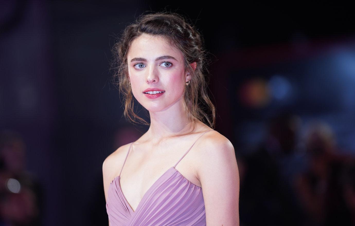 Margaret Qualley in a purple dress