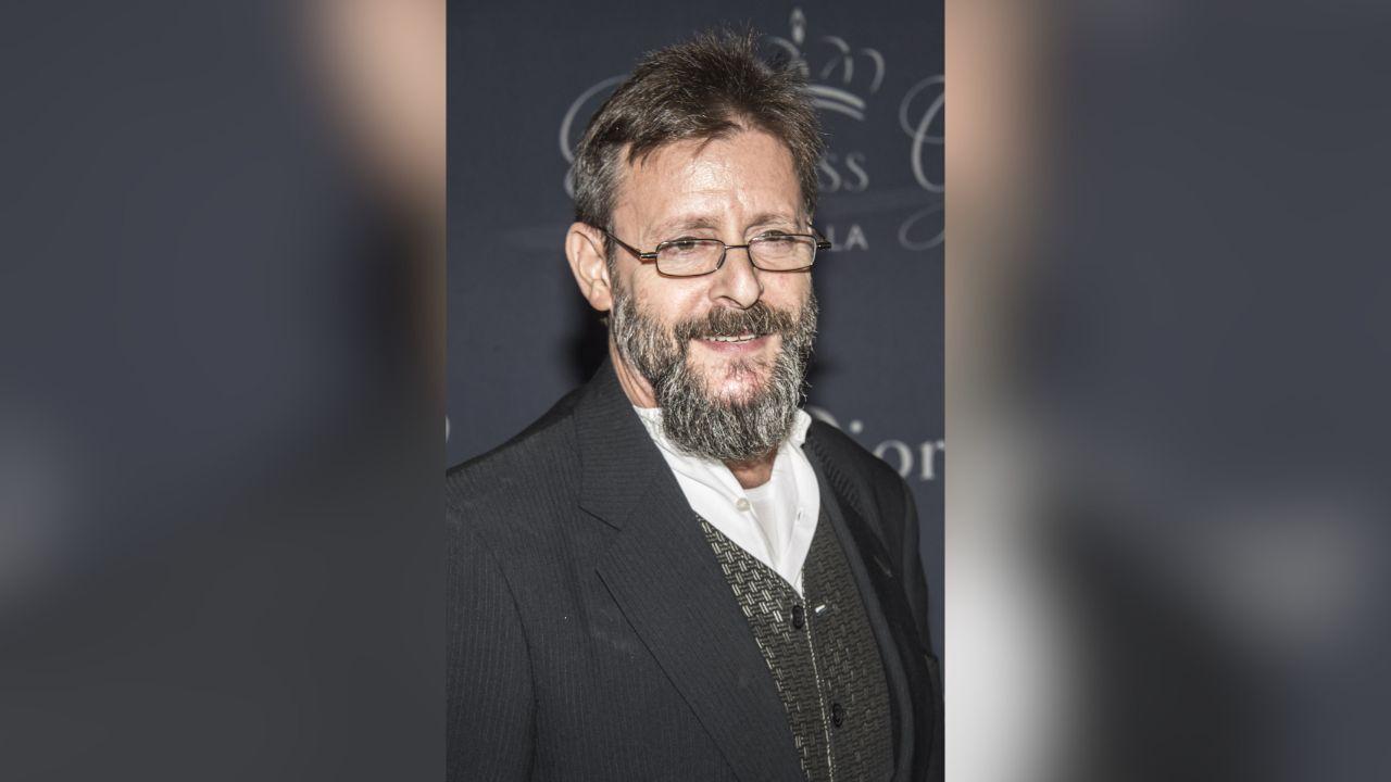 Image of Judd Nelson had seemingly grown his hair longer than he usually wears it.