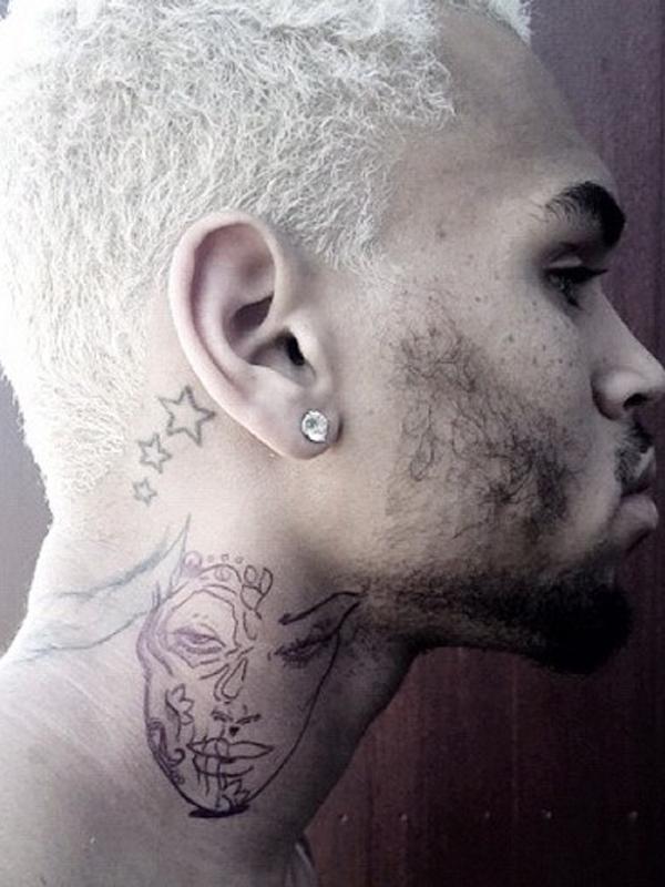 Chris Brown gets a neck Tattoo of Rihanna  Heiresss Says