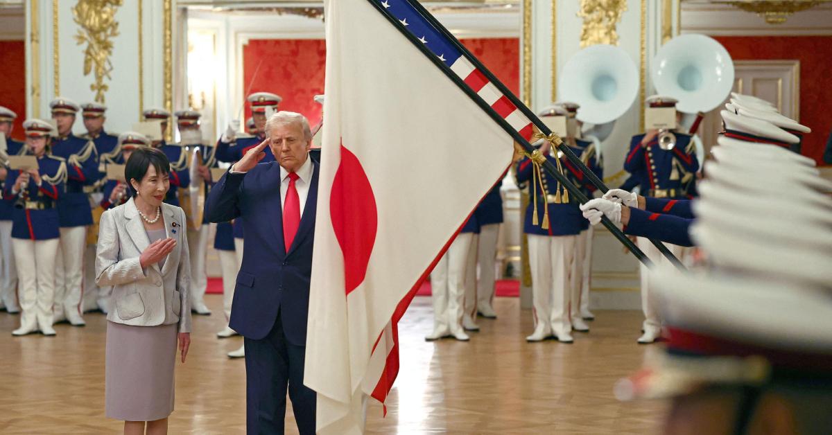 Image of Donald Trump saluted the American flag during the U.S.-Japan summit meeting.