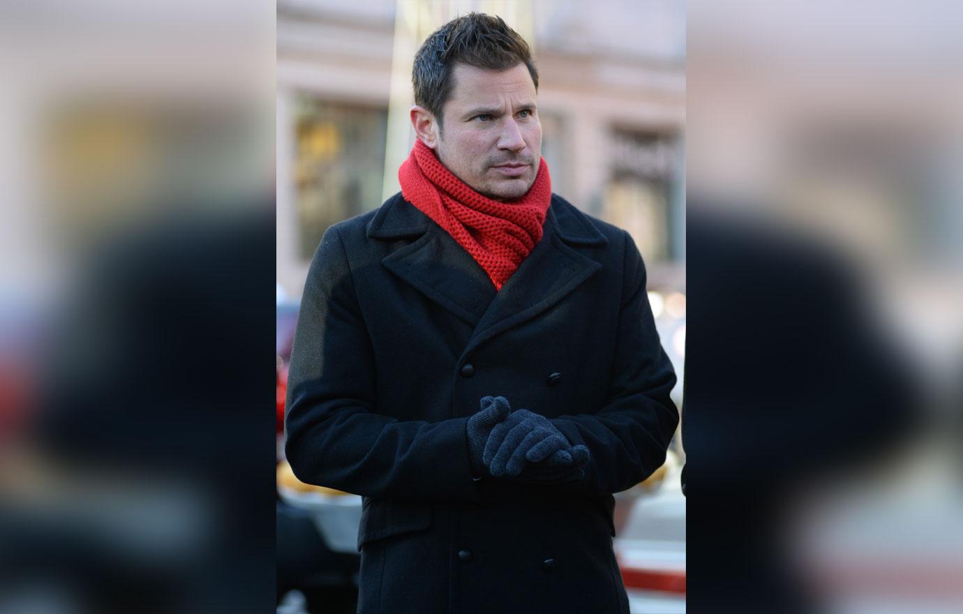 Nick Lachey Frowning With Red Scarf On