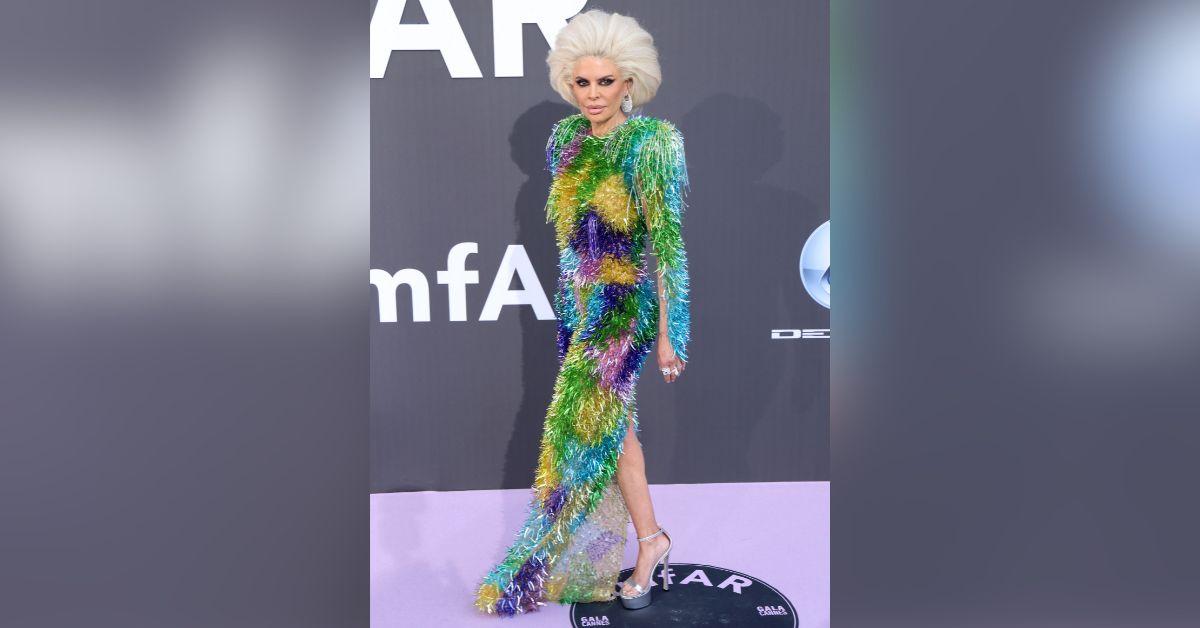 image of The former 'Real Housewives of Beverly Hills' star wore a colorful couture gown paired with a massive white bouffant hairstyle.