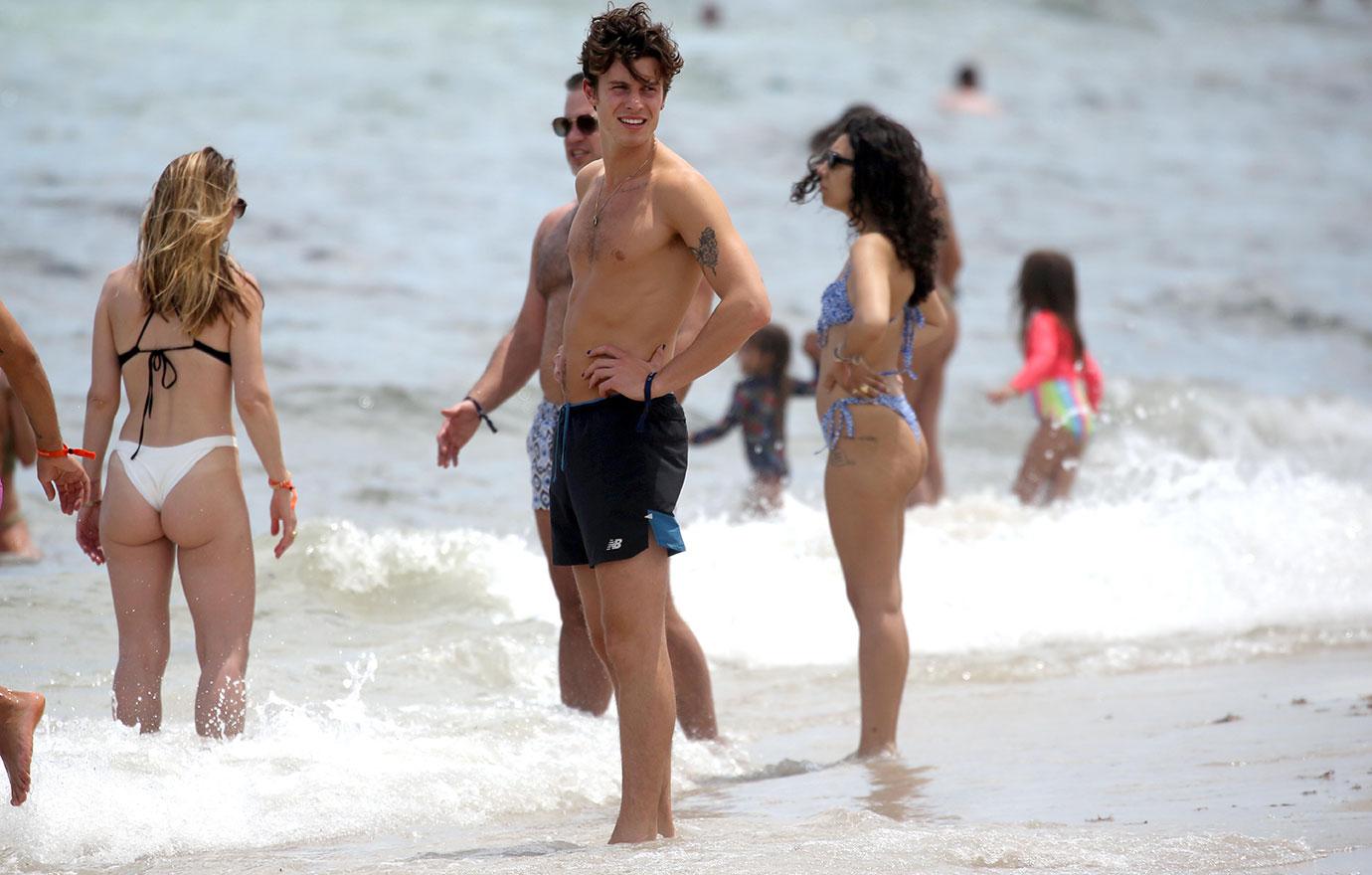 shawn mendes takes a dip in the ocean while in miami