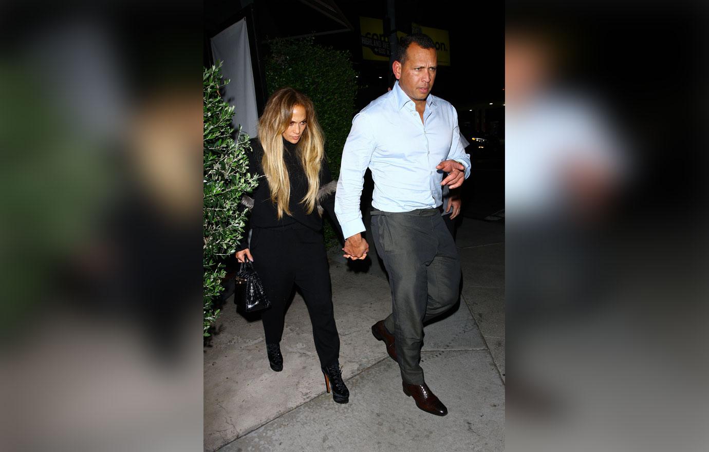 EXCLUSIVE: Jennifer Lopez holds hands with Alex Rodriguez as they leave Italian restaurant Osteria Mozza after having a romantic dinner